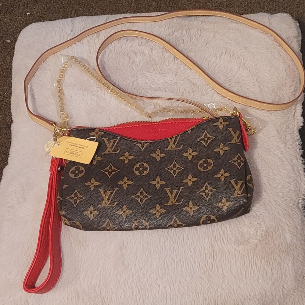 Louis Vuitton monogram Pallas cherry clutch.